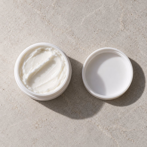 An open jar of YourZone cream
