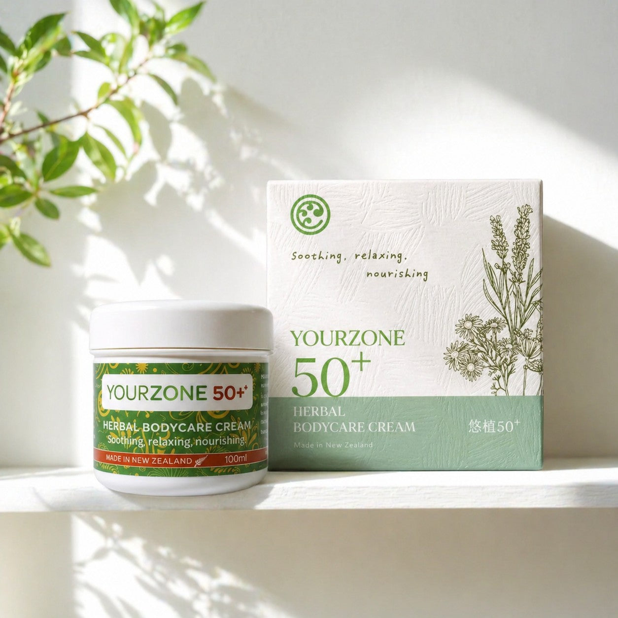 YourZone 50+ Herbal BodyCare Cream jar and box on a limestone plinth